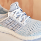 Adidas makes shoes from ocean plastic.
